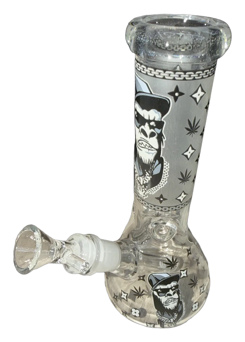 Clear glass beaker with frosted band and black and white gorilla artwork